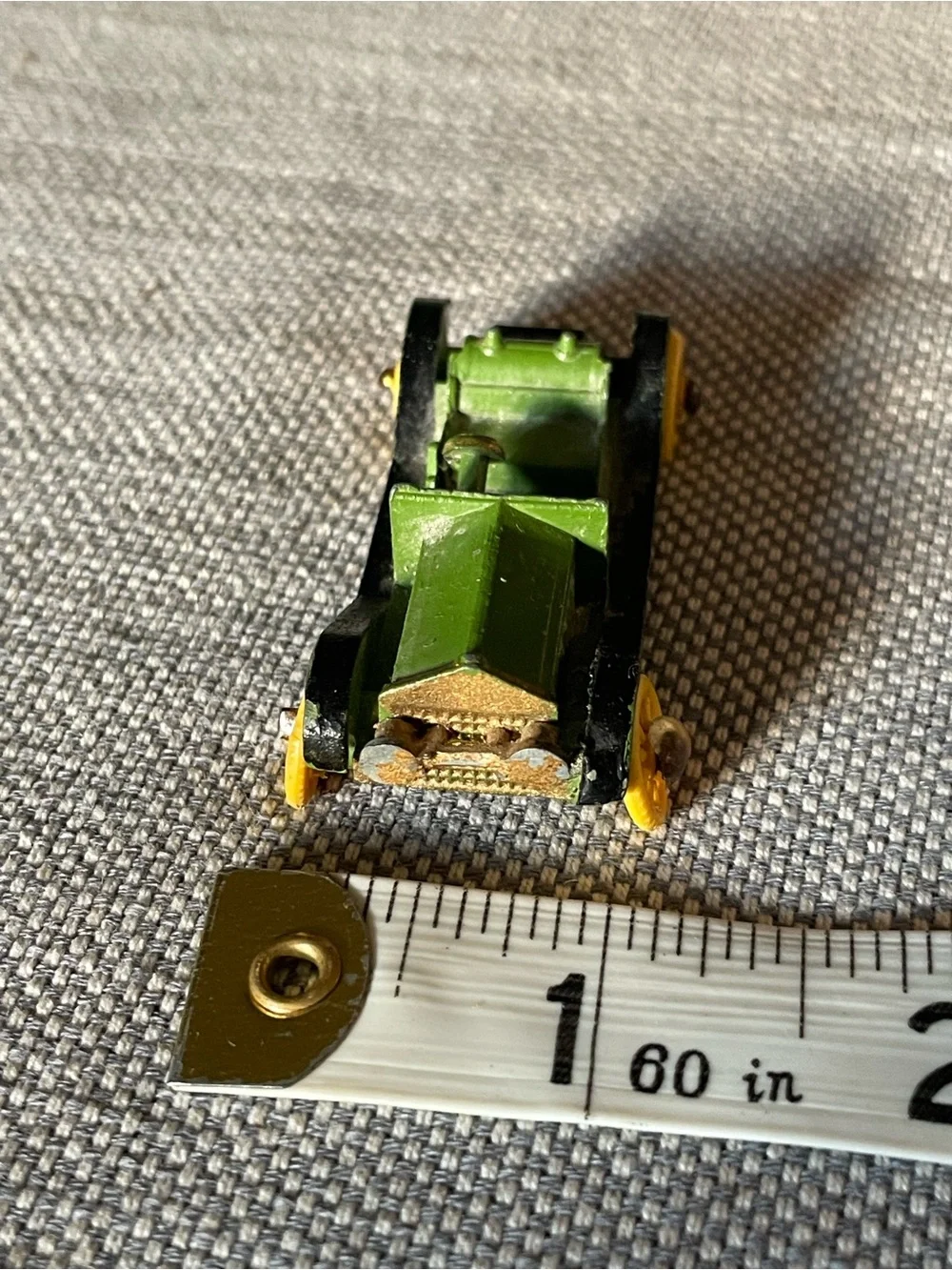 Vintage metal diecast car, made in England stamped on the bottom